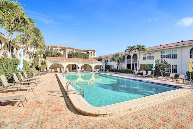 pool featuring a patio area