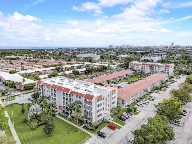 birds eye view of property featuring a city view