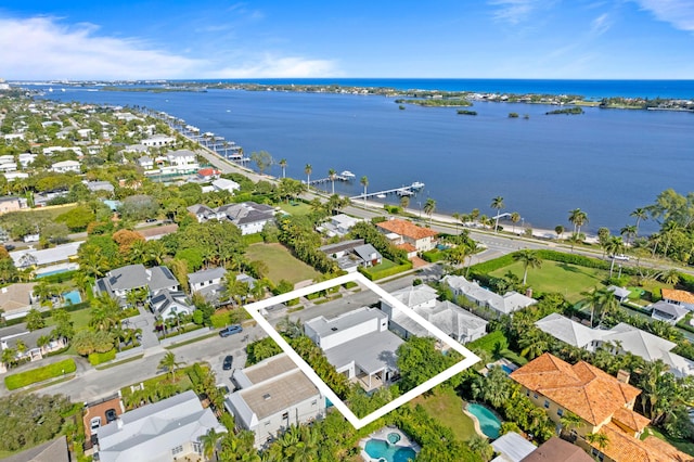 drone / aerial view with a water view