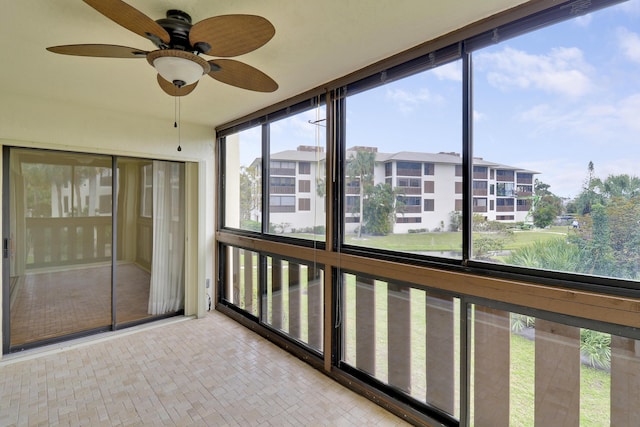 unfurnished sunroom with plenty of natural light