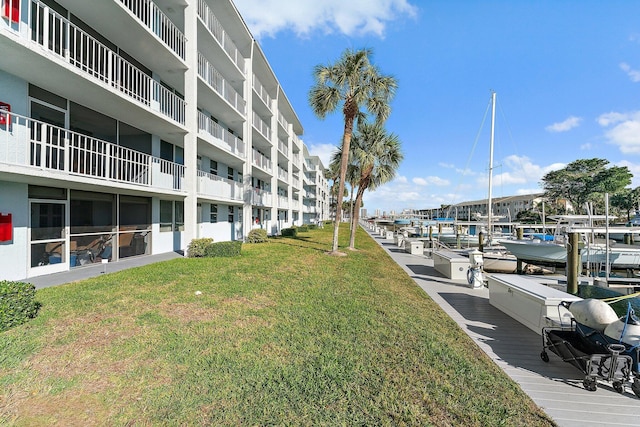 exterior space with a yard and a water view