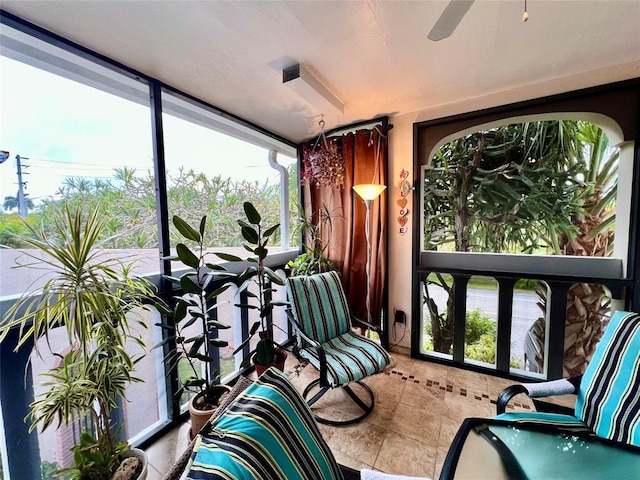 sunroom / solarium with ceiling fan