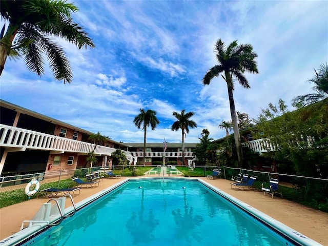 view of swimming pool with a patio