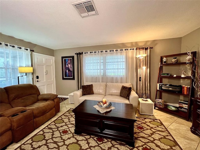 living room featuring light tile patterned flooring