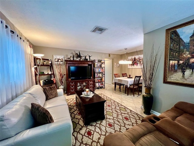 living room featuring light tile patterned floors