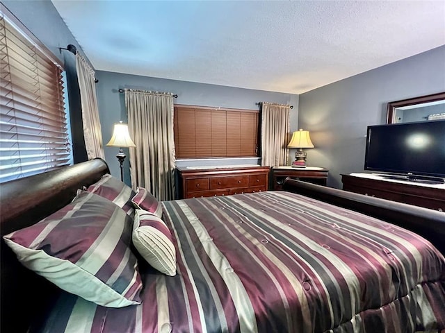 bedroom featuring a textured ceiling