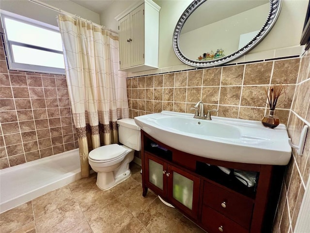 bathroom with toilet, walk in shower, decorative backsplash, and vanity