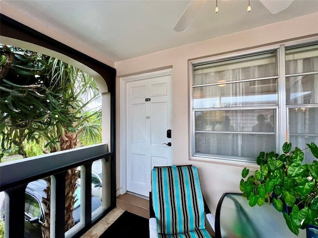 entrance to property with a balcony