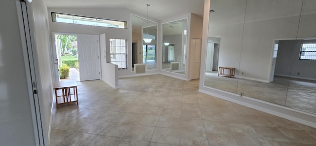 foyer with lofted ceiling