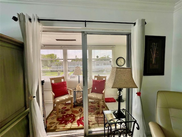 sitting room with crown molding