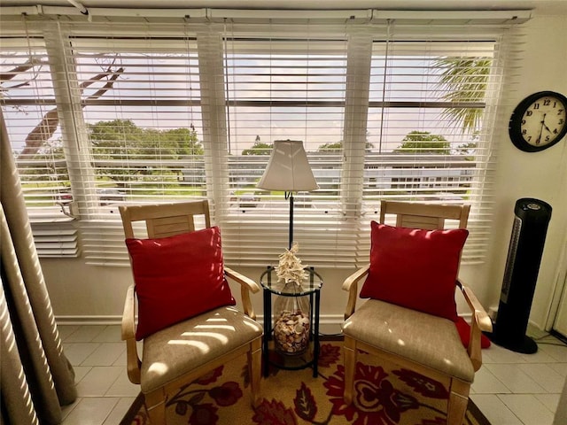 sitting room with tile patterned floors