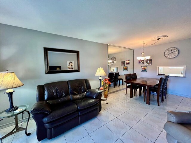 living room featuring a chandelier