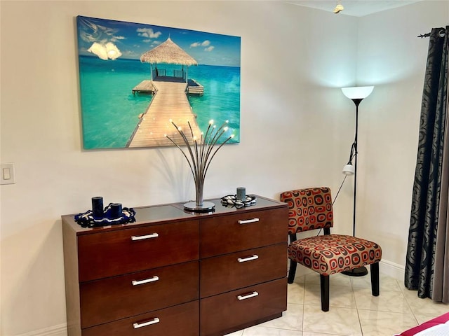 sitting room with light tile patterned flooring