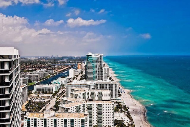 bird's eye view with a beach view and a water view