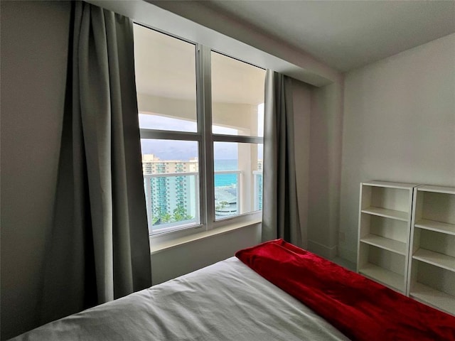 bedroom with a water view