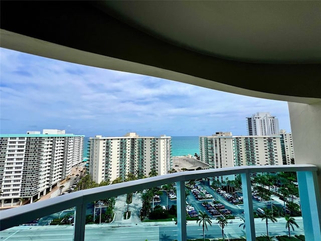 balcony featuring a water view