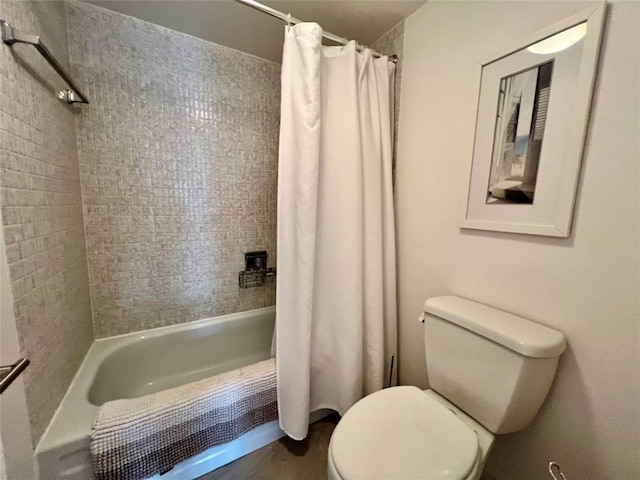 bathroom with toilet and shower / tub combo with curtain