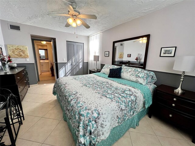 kitchen featuring white refrigerator, sink, electric range, tasteful backsplash, and light tile patterned flooring