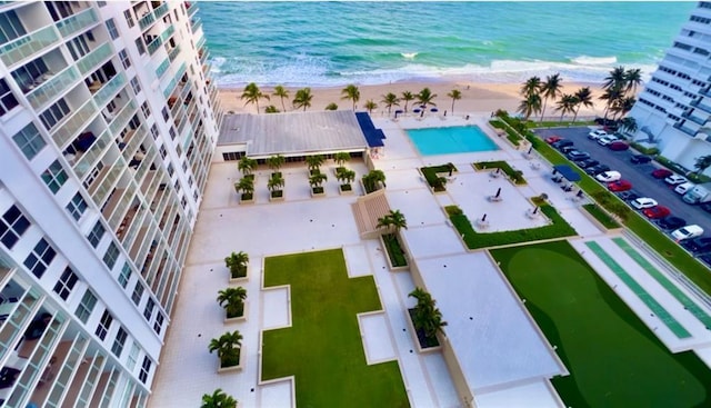 aerial view with a view of the beach and a water view