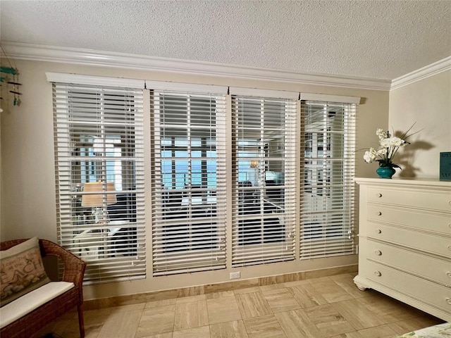 doorway to outside featuring light tile patterned floors, a textured ceiling, and crown molding