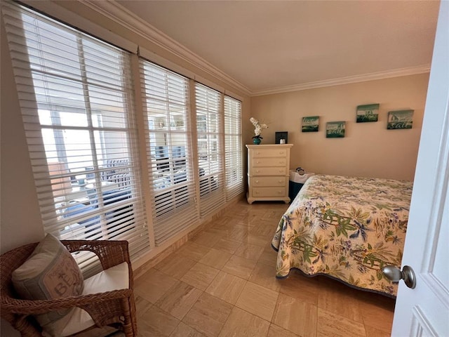 bedroom with ornamental molding