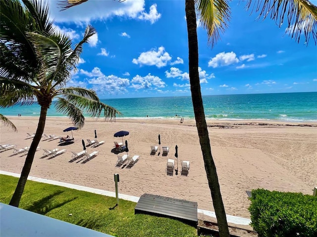 view of water feature with a beach view