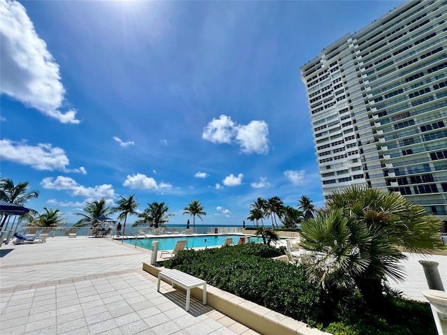 view of pool featuring a patio