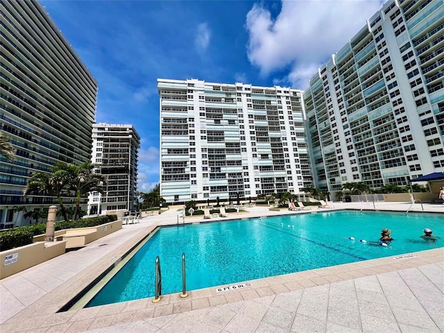 view of swimming pool featuring a patio