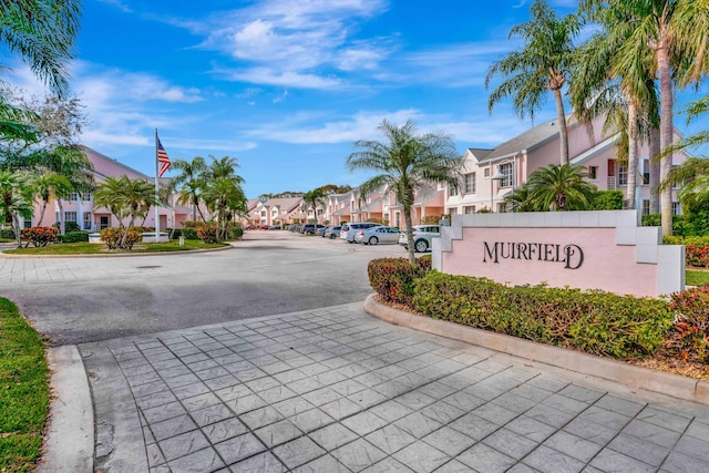 202 Muirfield Ct Unit E, Jupiter, FL 33458 - view of asphalt road featuring a residential view and curbs