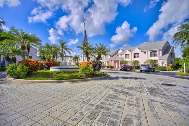 202 Muirfield Ct Unit E, Jupiter, FL 33458 - view of street featuring a residential view and curbs