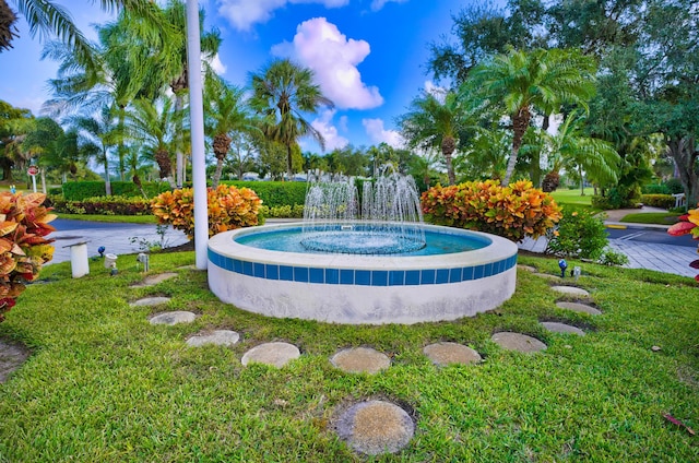 202 Muirfield Ct Unit E, Jupiter, FL 33458 - view of swimming pool featuring a yard