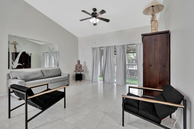 living room with light tile patterned floors, high vaulted ceiling, and ceiling fan