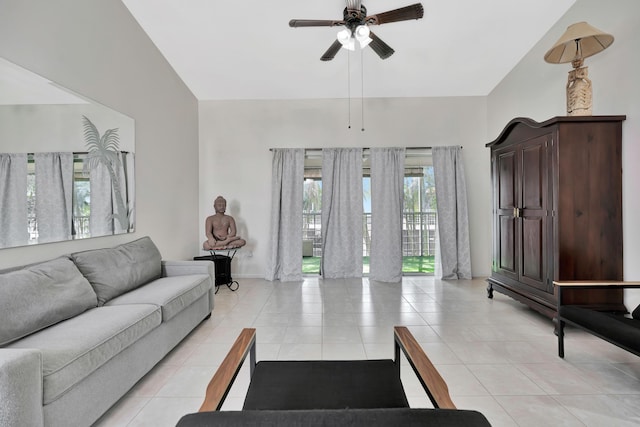 living room featuring light tile patterned floors and ceiling fan