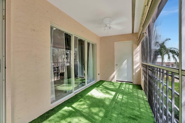 202 Muirfield Ct Unit E, Jupiter, FL 33458 - unfurnished sunroom featuring ceiling fan