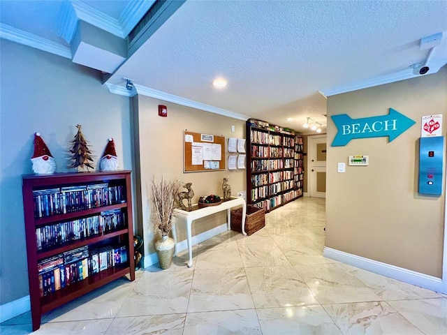 hallway featuring a textured ceiling and crown molding