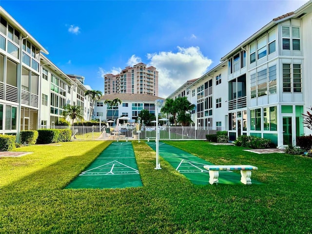 view of home's community featuring a yard