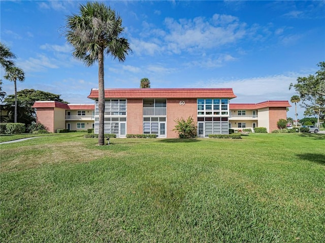 exterior space featuring a front lawn