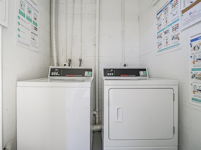 washroom with separate washer and dryer