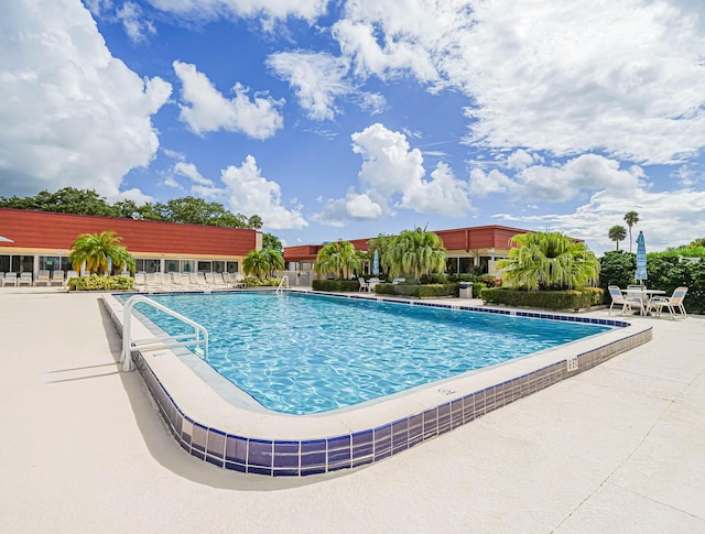 view of pool featuring a patio