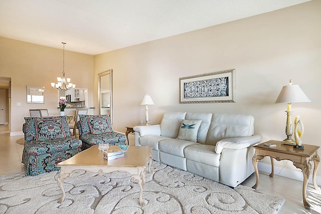 tiled living room with a chandelier