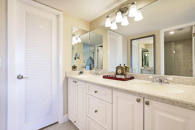 bathroom featuring tile patterned floors and vanity