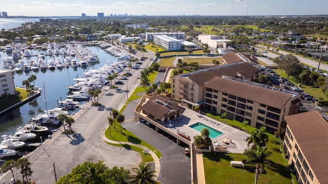 birds eye view of property with a water view