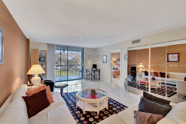 living room featuring a textured ceiling