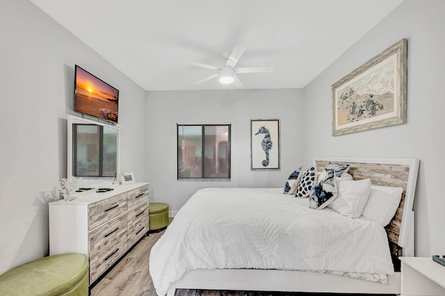 bedroom featuring ceiling fan and light hardwood / wood-style flooring