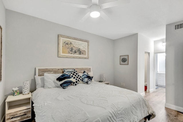 bedroom featuring ceiling fan and light hardwood / wood-style floors