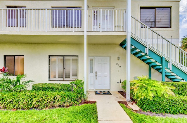 doorway to property featuring a balcony