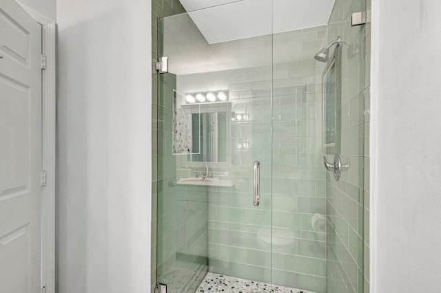 bathroom featuring walk in shower