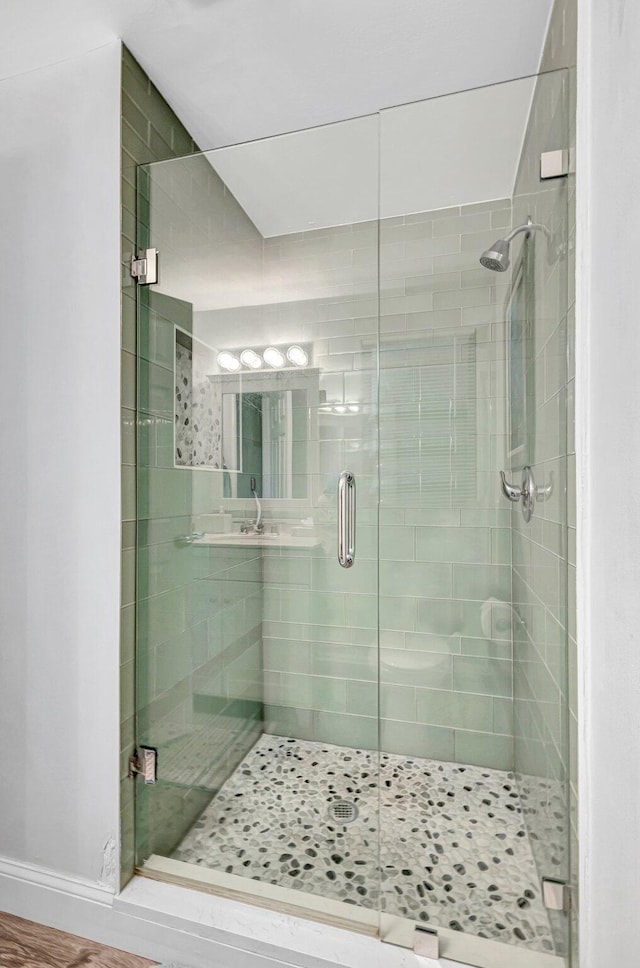 bathroom featuring walk in shower