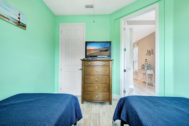 bedroom featuring light wood-type flooring