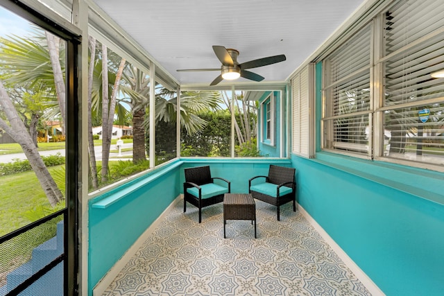 sunroom / solarium with ceiling fan